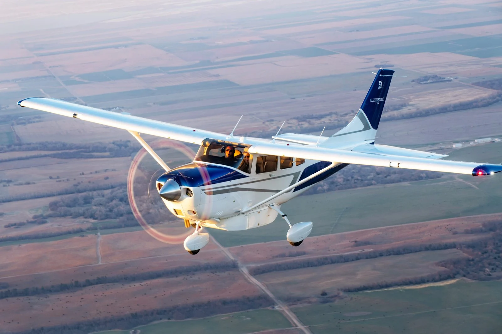 Cessna Stationair in flight at golden hour